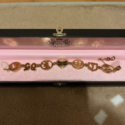 Juicy Couture Bangle bracelet Charm Gold Heart ribbon crown and cherries