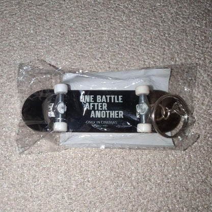 Prize: One Battle After Another Skateboard-shaped Keychain From Japan