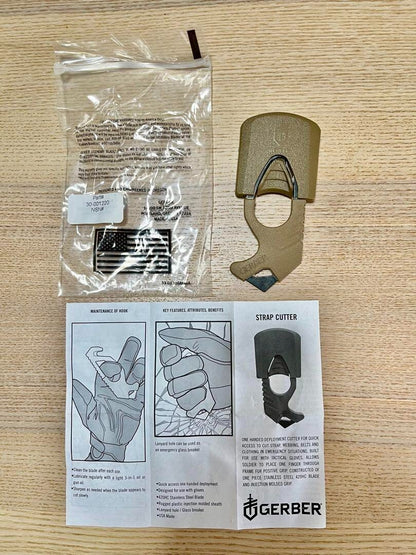 U.S. military release, new and unused GERBER strap cutter glass breaker