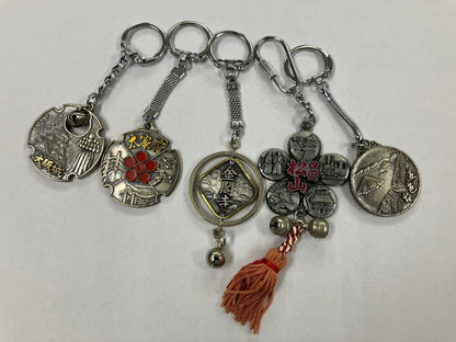 Set of 5 Keychains featuring Osaka Castle, Kinkaku-ji Temple, and others.