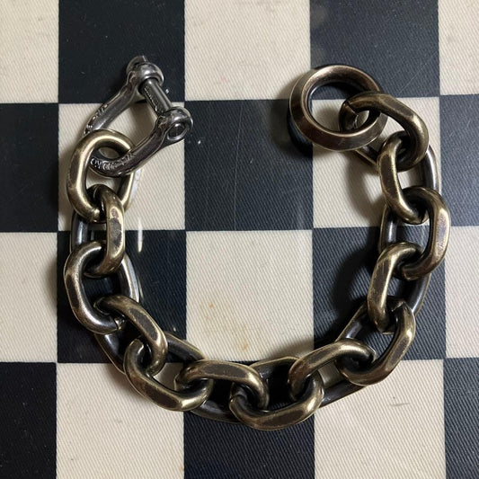 Brand new, unused brass bracelet featuring a vintage North & Judd hook