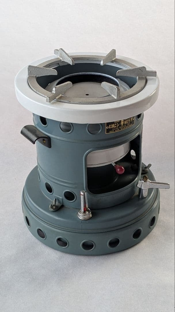 Unused Robin kerosene stove, model No. 5, Hope 5 type, with instruction manual.