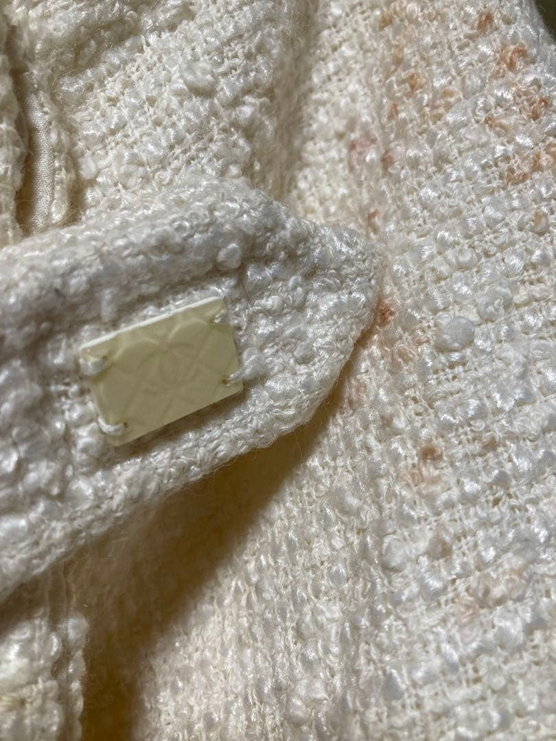 USED CHANEL TWEED SKIRT, SIZE 40, IVORY. ACCEPTABLE