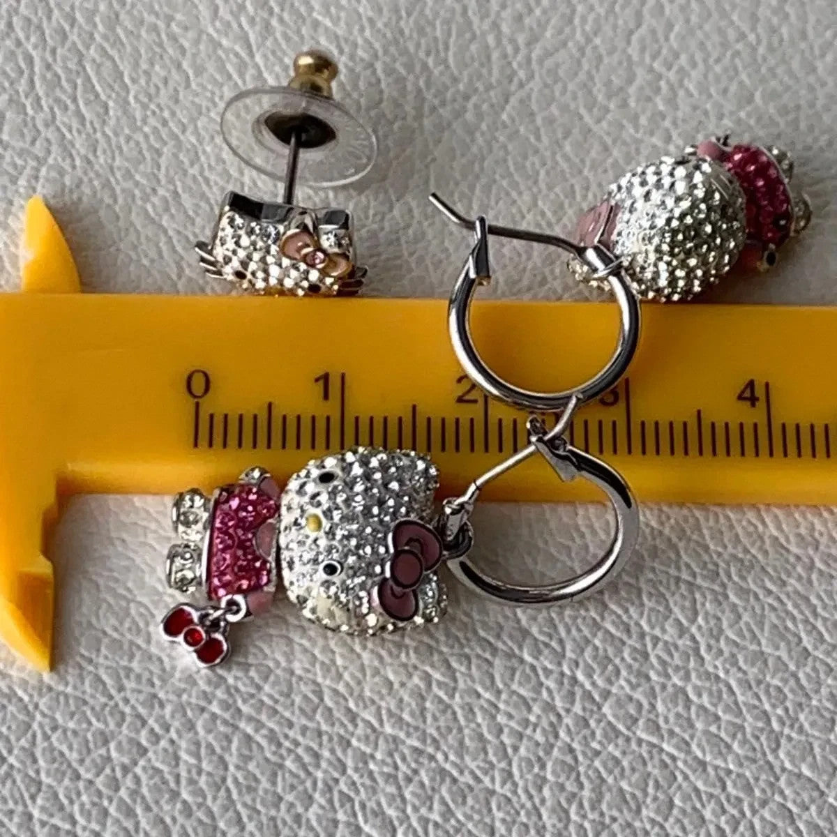 Rare, discontinued Hello Kitty earrings, Swarovski crystal hoop earrings set.