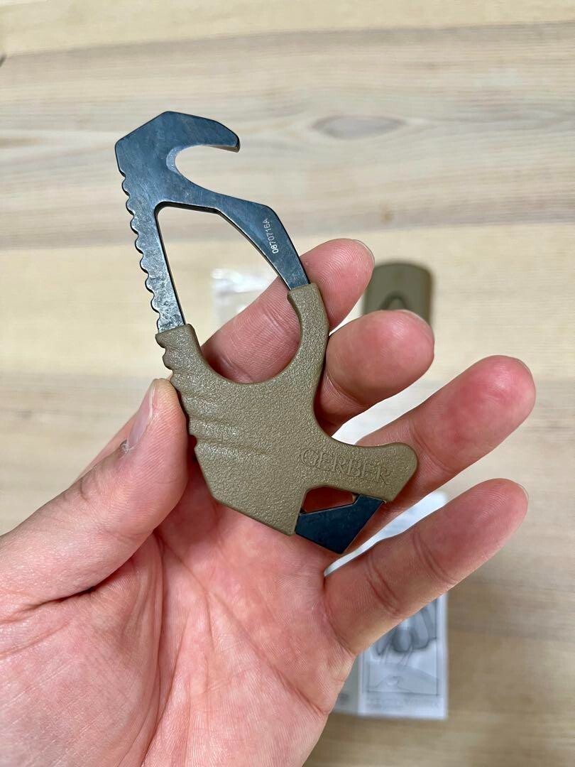 U.S. military release, new and unused GERBER strap cutter glass breaker