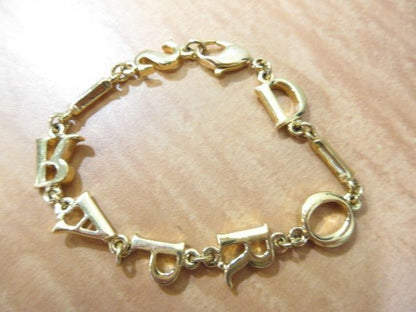 Authentic Christian Dior DIOR PARIS Logo Bracelet Gold Tone GP Vintage Jewelry