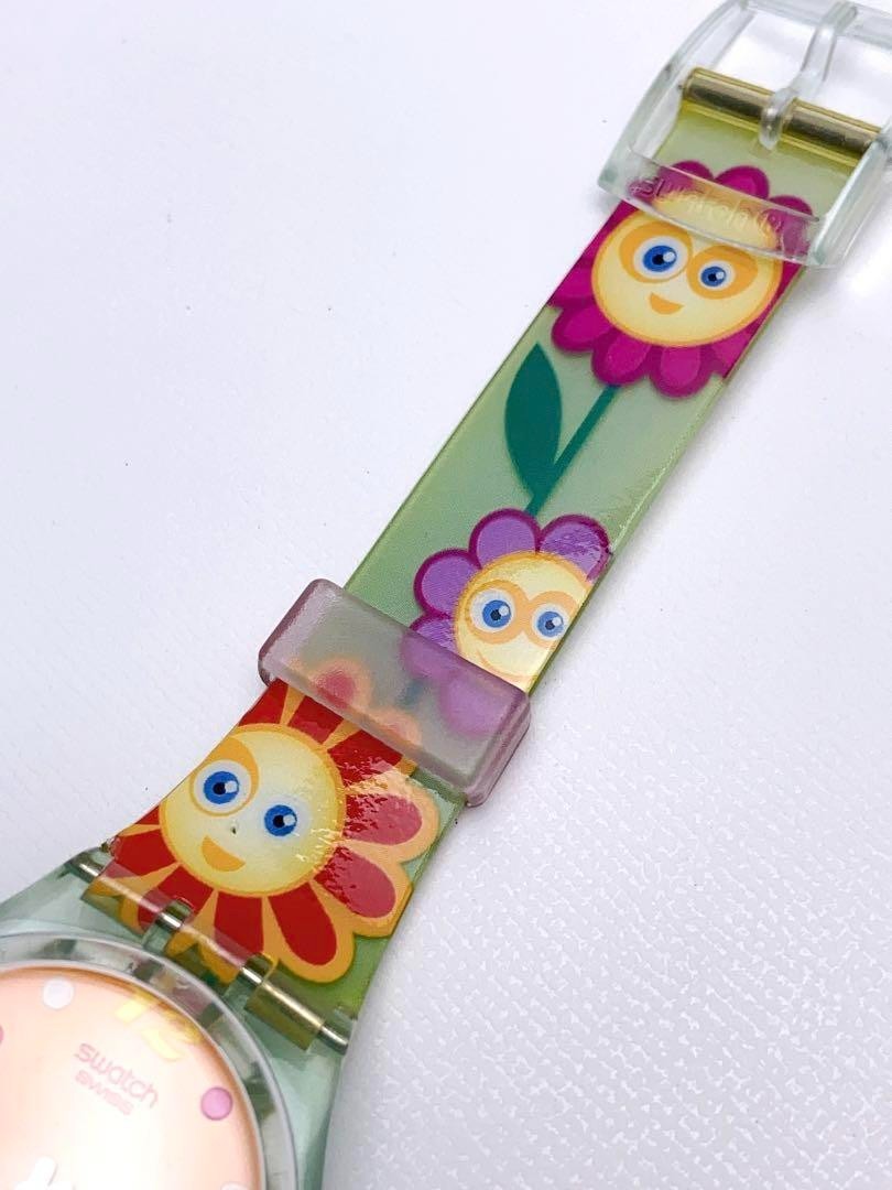 T612 Swatch Watch Quartz Orange Dial Floral Flower There is a name written Used