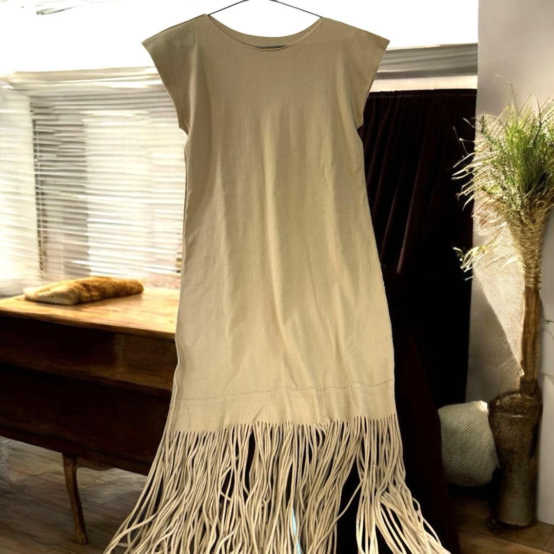 USED EXCELLENT CONDITION ISSEY MIYAKE FRINGE SLEEVELESS NYLON DRESS BEIGE. GOO