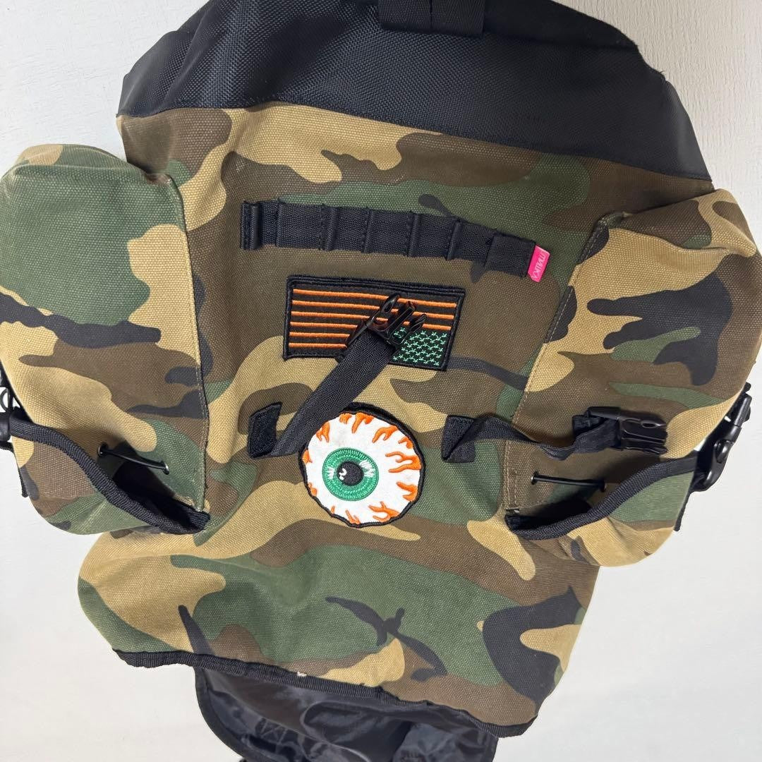 MISHKA Camouflage Eyeball Backpack