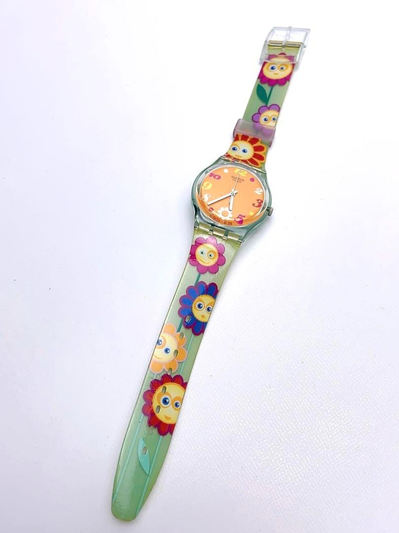 T612 Swatch Watch Quartz Orange Dial Floral Flower There is a name written Used