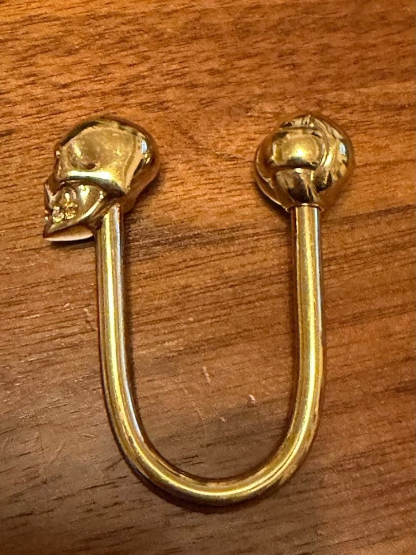 Alexander McQueen Skull U-shaped Keychain Gold Tone Metal