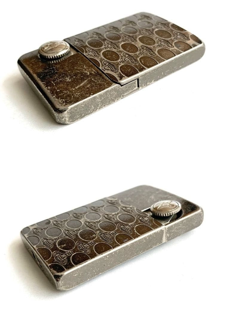 Vivie[Used] Vivienne Westwood Gas Lighter Orb Silver patterned all over no flint