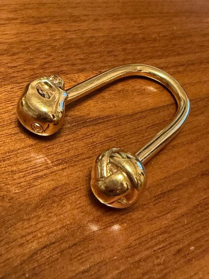 Alexander McQueen Skull U-shaped Keychain Gold Tone Metal