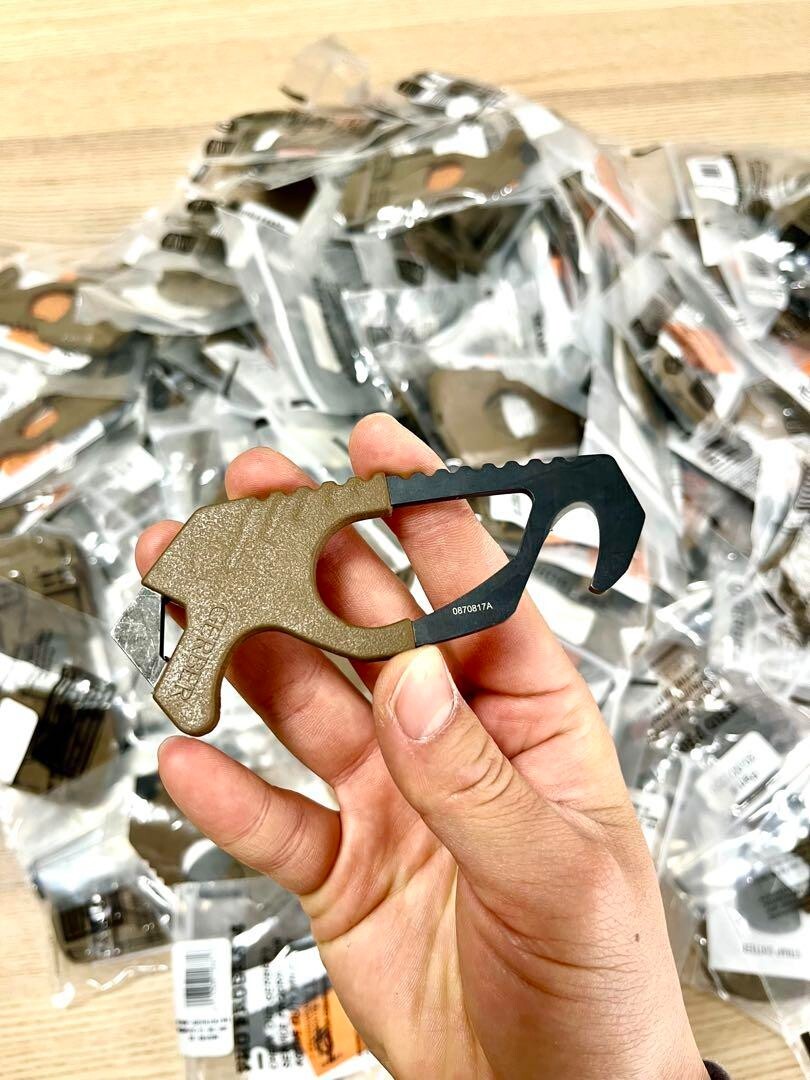 U.S. military release, new and unused GERBER strap cutter glass breaker
