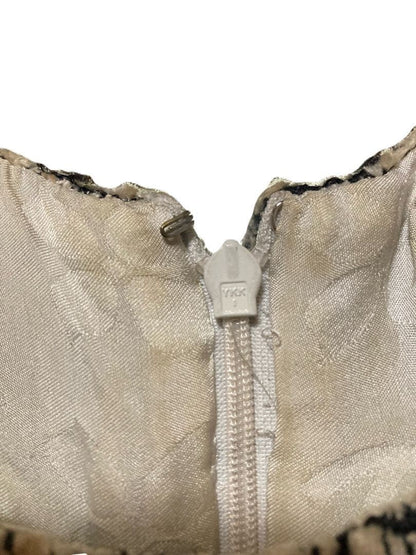USED CHANEL TWEED SKIRT, SIZE 40, IVORY. ACCEPTABLE
