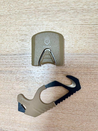 U.S. military release, new and unused GERBER strap cutter glass breaker
