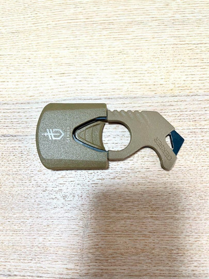 U.S. military release, new and unused GERBER strap cutter glass breaker