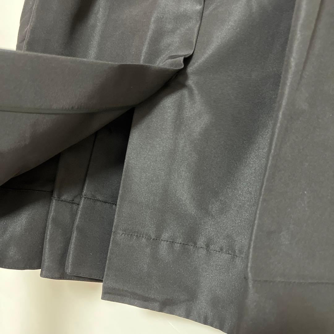 USED PRADA NYLON MINI SKIRT WITH FRONT BUTTONS, BLACK, SIZE 40, VINTAGE GOOD