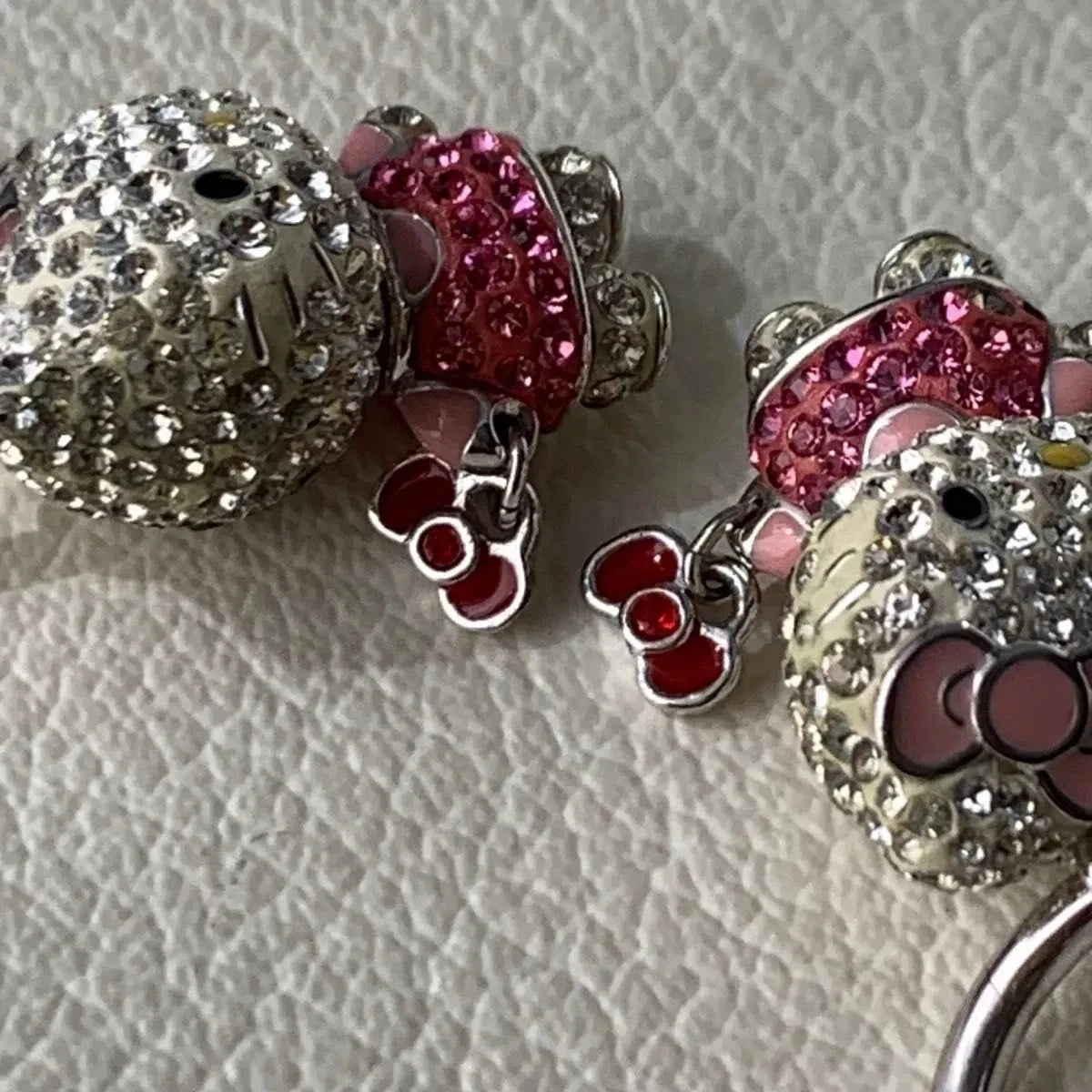 Rare, discontinued Hello Kitty earrings, Swarovski crystal hoop earrings set.