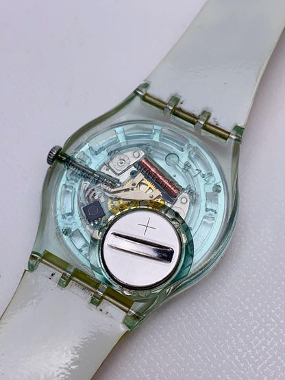 T612 Swatch Watch Quartz Orange Dial Floral Flower There is a name written Used