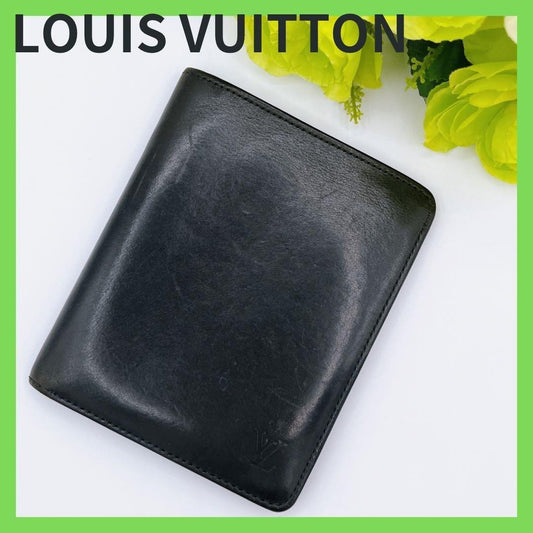 LOUIS VUITTON Nomade 10 Credit Bifold Wallet Leather Black M85013 from Japan
