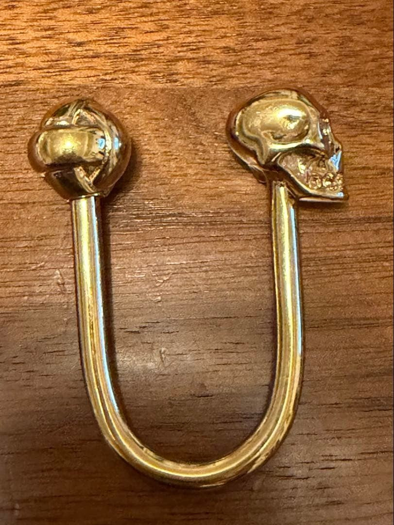 Alexander McQueen Skull U-shaped Keychain Gold Tone Metal