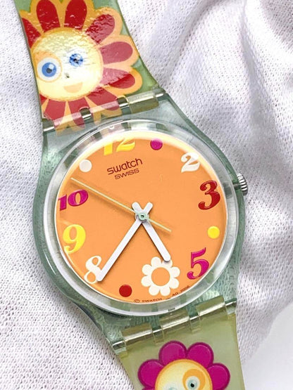 T612 Swatch Watch Quartz Orange Dial Floral Flower There is a name written Used