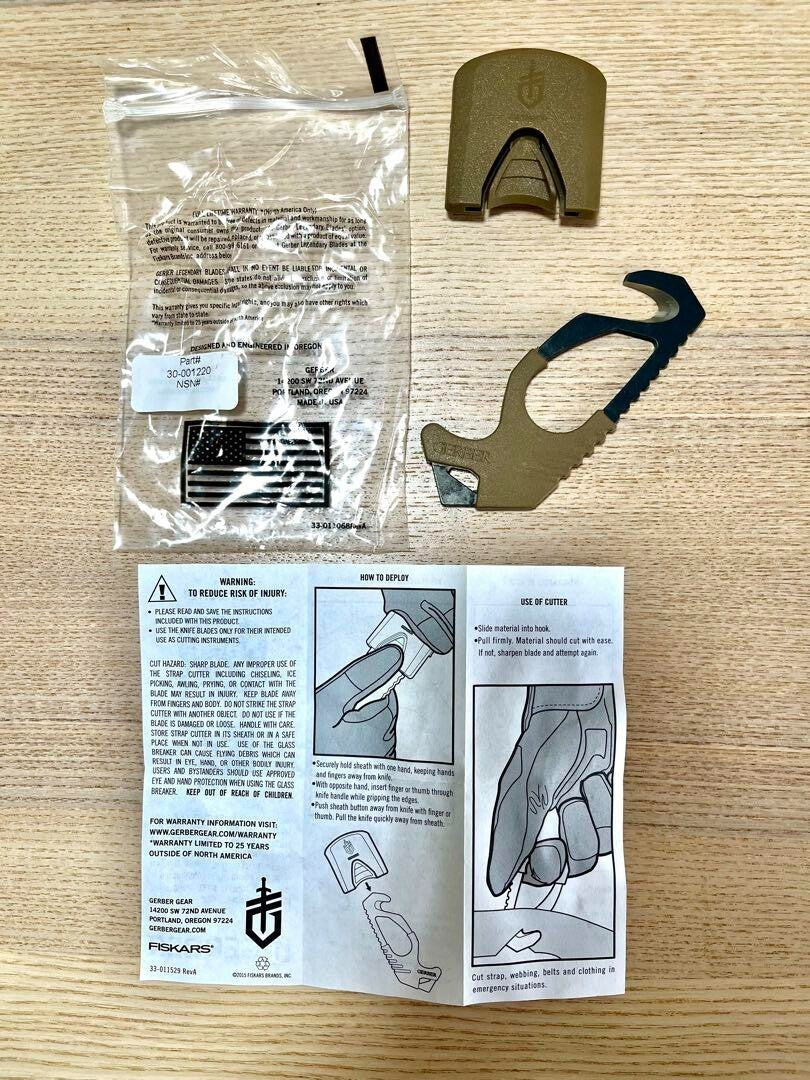 U.S. military release, new and unused GERBER strap cutter glass breaker