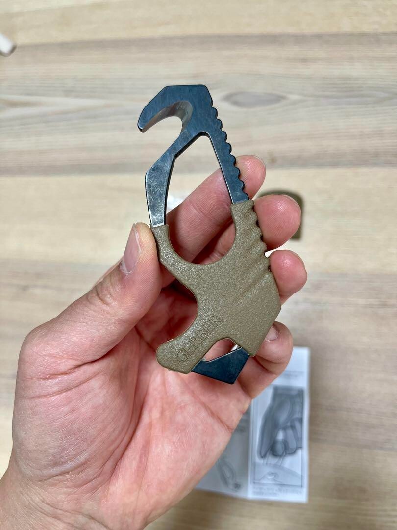 U.S. military release, new and unused GERBER strap cutter glass breaker