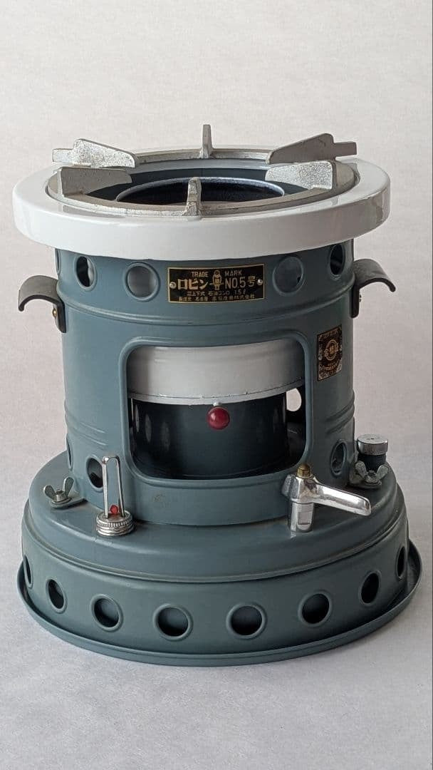 Unused Robin kerosene stove, model No. 5, Hope 5 type, with instruction manual.